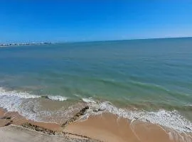 Pé na Areia Sereia da Oceania Bessa