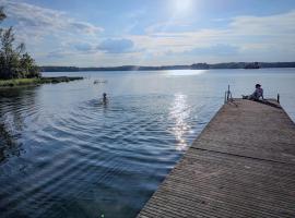 Boats stay play lake cabin, hotel in Broby