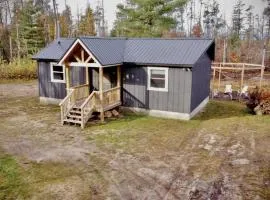 Secluded Rustic Cabin with Hot Tub Near Pere Marquette River in Big Rapids, Michigan
