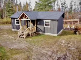 Secluded Rustic Cabin with Hot Tub Near Pere Marquette River in Big Rapids, Michigan
