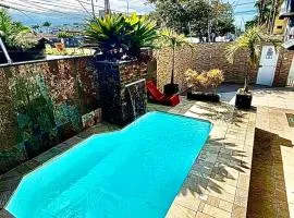 Casa Pé na Areia com Piscina Climatizada