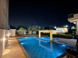 The Starlight Farmstay- Poolside Tent Stay in Jaipur