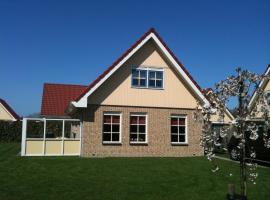 Vakantiehuis Zeeduinenbos، فندق في سكورل