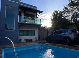 Casa de Verão, 04 quartos, 03 banheiros, piscina e churrasqueira para relaxar