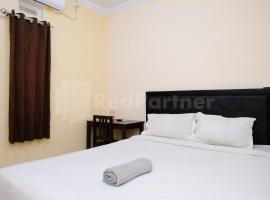 Mas Klimis Guesthouse Pakuwon Mall Mitra RedDoorz, hôtel à Kejayan