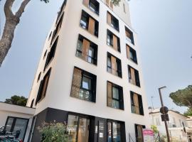 Residence Cala Vela Tower, място за настаняване на самообслужване в Ричоне