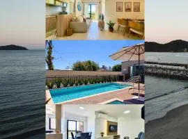 Apto 2 Quartos PISCINA Churrasqueira Wi-Fi Ar Condicionado Cozinha Complata Vaga de Garagem 400m PRAIA Ideal para Famílias ou Amigos Reserve Agora