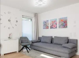Modernes Apartment mit Terrasse & Garten, Parkplatz & Self-Check-in