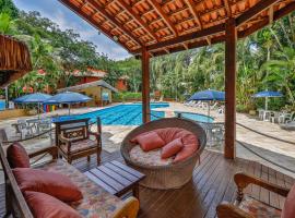 Flat estudio 110 Amarilis Riviera de São Lourenço, 03 piscina climatizada, serviço de hotelaria, limpesa e troca de toalhas diária, carregador veiculo elétrico e servico de praia finais de semana WiFi 500, hotel in Riviera de São Lourenço