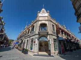 烟台朝阳文保艺术酒店, khách sạn ở Yên Đài