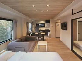 AURA YUZAWA Apartment Hotel - Spacious 1Bedroom Apartment with Large Living Room Sleeps 4 to 6, Bedroom with 2-Double Beds, Living Room with 1-Double Bed & 1-Sofa Bed