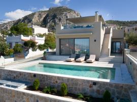Ammos Luxury Villas Salamina, hotel din Aiándion