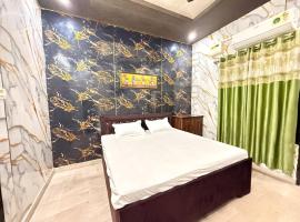 Hotel Tirupati Lawn，位于勒克瑙Chaudhary Charan Singh International Airport - LKO附近的酒店