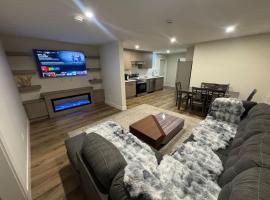 Peaceful 2BR Getaway with Fireplace & Parking Basement Suite, Hotel in Abbotsford