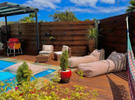 Villa Fare Mananui 2 chambres avec piscine et jardin, hotel in Paea