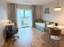 Studio apartment with gym and coworking space