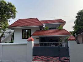 Temple Courtyard，位于Chengannūr的酒店