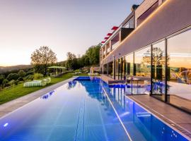 Hüttenhof - Wellnesshotel & Luxus-Bergchalets - Adults only, hotel in Grainet