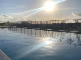 Apartamento com piscina, terraço, churrasqueira e estacionamento