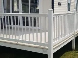 8 Berth Caravan With Decking To Hire At Naze Marine In Essex Ref 17012Rd