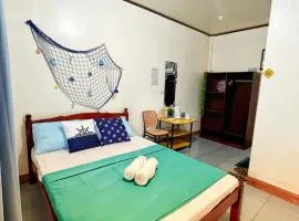 Bantayan Paw and Palm Stays by Junmar Lodge