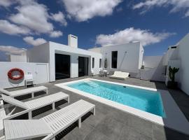 Casa Blanca - Villa à Teguise avec piscine privée, hotel en Teguise