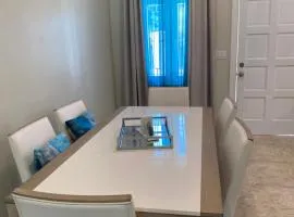 One Tropical Palm Townhouse