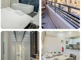 Luxury Jacuzzi Apt with AUC View