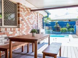 Theme Park Retreat - Sunlit Stillness by the Pool