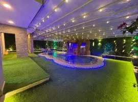 7 BR Smart House with Heated Pool, Waterfall, Garden