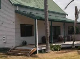 Hosts on the Coast Titoki Palms