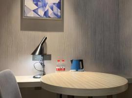 Echarm Hotel Yiyang Wanda Plaza, hotel v destinaci Heshanqu