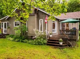 Charming Waterfront Cottage with Private Dock on Peaceful Otter Lake near Huntsville, Ontario