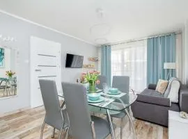 Seaside Apartment with a Swimming Pool and Sauna Close to the Beach in Kołobrzeg by Noclegi Renters