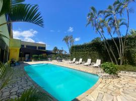 Piscina e Mar PousadaH, hotel i Guarujá