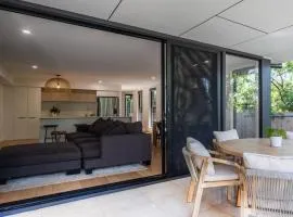 Stylish Sun Soaked Duplex Walk to Beach