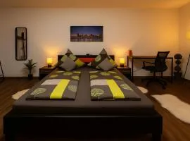 Homefeld Suite - Elegante und moderne Ferienwohnung zentral in Hünfeld bei Fulda mit Küche, kostenlosem Parkplatz und WLAN