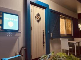 Jazz 喫茶 Eju イージュ B&B, hotel in Urasoe