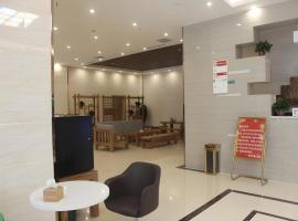 GreenTree Inn Shandong Heze Caoxian Zhuangzhai Town Oriental Times City Business Hotel, hotel v destinaci Taoyuan