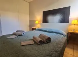 Appartement climatisé dans une résidence avec piscine mer à pied