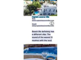 Located by the sea one Beachfront Detach Private Captain Lazaros Pool Villa with loft in 750sqm spacious private plot-Jacuzzi-sunrelax-furnished terace-gazebo-private parking,sleep 3 adults and 2 children, just steps from the Black Beach-Seaview