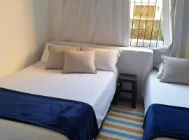 Quarto na praia banheiro compartilhado