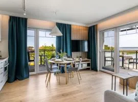 Port Krynica 16 - apartament premium w centrum Krynicy Morskiej z bezpośrednim widokiem na port i Zalew Wiślany