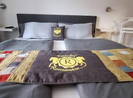 Reiterhof Romanasa Ferienwohnung, מלון בפליס