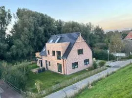 Deichkoje12 Deck 1 EG direkt am Eiderdeich nur 7 km bis zur Nordsee und 20 Min bis Sankt Peter Ording