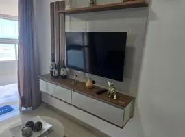 Apto frente mar 2 suítes piscina Centro Mongaguá