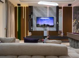 Elysian shores suites - BRADFORD, hotel en Aja