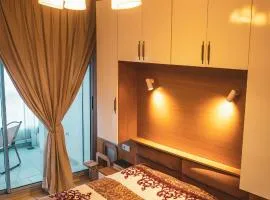 Beachfront Apt in Aourir Pool, Surf & Comfort