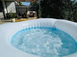 Exclusive Garden Oasis with Jacuzzi & Private Parking