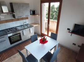 Casa Cao Appartamento "L'Ulivo", хотел в Nurachi